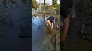 S0142 Unclogging a storm drain on a playing area in Germany shorts [upl. by Kcirde41]