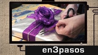 Cómo envolver un regalo de Navidad [upl. by Enelhtak750]