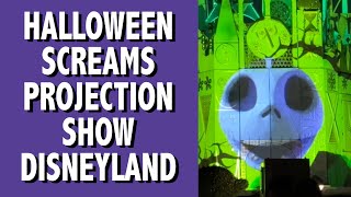 Halloween Screams Projections on Its A Small World Facade Disneyland [upl. by Delmar]