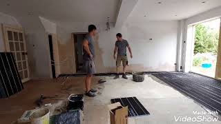 Installation of under floor heating Polypipe Overlay Plus panels and pipes for under floor heating [upl. by Ellebyam]