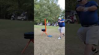 Big hitter takes swing on softball hitting station at golf course [upl. by Freud510]