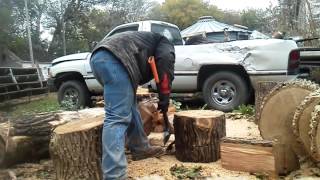 Splitting ash firewood with a fiskars splitting axe [upl. by Ydisahc924]