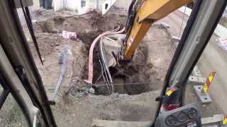 Excavation around a water supply manhole with rotortilt on Liebherr 314 in Norway [upl. by Chrissy]