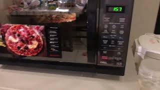 How to cookreheat pizza in sharp microwave oven shorts pizza microwaveoven sharp julies [upl. by Enimasaj]