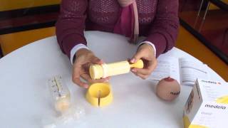 INSTRUCCIONES DE ENSAMBLE DEL EXTRACTOR DE LECHE MATERNA BASE DE MEDELA [upl. by Lesde]