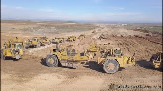 Digging new landfill cell with fleet of Caterpillar scrapers Part 1 [upl. by Wiltshire]