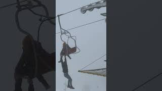 A man found himself hanging precariously from a ski lift clinging on to his partner for dear life 😰 [upl. by Marciano]