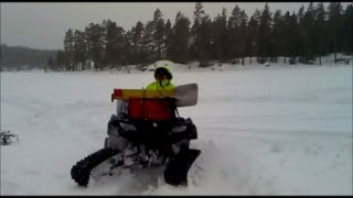 Suzuki King quad 750 4x4 ATV with Camoplast tatou 4s snow tracks kit belter 4 four wheeler [upl. by David31]