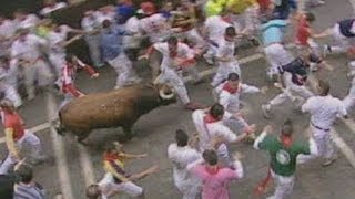 Running of the bulls Three gored in Pamplona [upl. by Eniamahs]