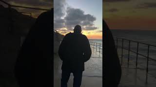 A Man a Sunset and a Purple Sandpiper Overstrand Norfolk sunset birds [upl. by Essiralc]