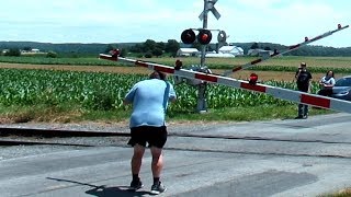 Railroad Crossing Gates Lands On Mans Head [upl. by Thebazile489]