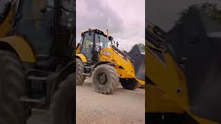 The New JCB Backhoe Loader Moving Material [upl. by Sifan527]