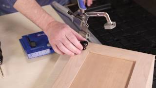 How to Install Knobs On Cabinet Doors [upl. by Calabresi78]