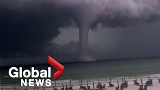 Huge waterspout spotted during quotwickedquot storm off Florida gulf coast [upl. by Thistle]