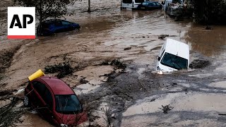 WATCH Emergency services rescue driver trapped in flood waters in Spain [upl. by Salahi]