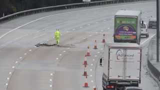 Pothole appears on the M25 Motorway the busiest road in Europe [upl. by Ranip]