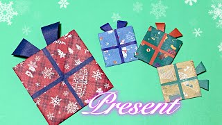 【折り紙】可愛いリボン付きプレゼントの折り方 クリスマスの飾りに！Christmas Origami Present Box  fukuoriroom [upl. by Foote889]