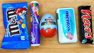 Unpacking Lollipops Snickers and Kinder Joy ASMR [upl. by Itaws]