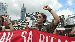 Philippines Demonstrators rally against constitutional reform on revolution anniversary  AFP [upl. by Dnalro58]