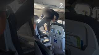 Disruptive passenger kicks chair on United flight from Austin to Los Angeles [upl. by Tsepmet341]