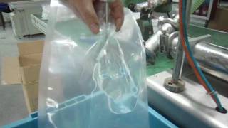 How to filling alcohol hand sanitiser into 4 sides sealed disposable pouch [upl. by Laenaj20]