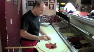 Cheese pizza in Largo FL Santo Make Pizza Calzone in Largo FL Sardos Pizza [upl. by Karl]