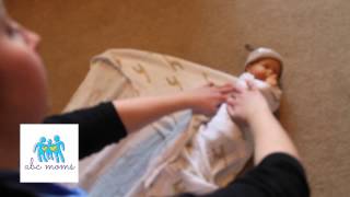 How to Swaddle Baby in a Receiving Blanket [upl. by Nnad]