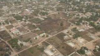 landing at yundum flying over the turntable airport road [upl. by Aihsi]