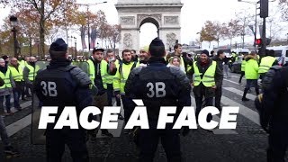 Les images des heurts entre gilets jaunes et police sur les ChampsElysées [upl. by Koeninger]