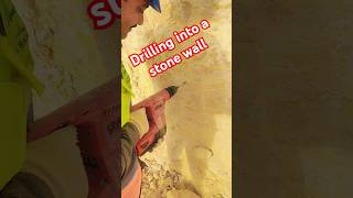 Drilling into a quarried stone wall shorts shortvideo [upl. by Cosimo]