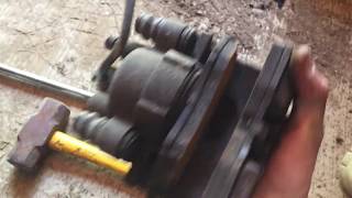 How to remove the brake caliper and line off your Dodge neon [upl. by Seltzer467]