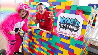 GIANT LEGO CANDY DRIVE THRU Candy Dispenser Restaurant Store [upl. by Lenneuq461]