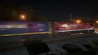 Pacific Nationals NR110 with Ghan livery and NR10NR8 lead 5BS6 through Greenbank 121224 [upl. by Teirtza995]