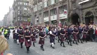 Massed Pipes amp Drums on Edinburghs Royal Mile [upl. by Sefton848]