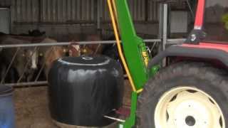 Feeding silage with Same Explorer amp McHale 994 Round Bale Splitter 2013 [upl. by Bonn144]