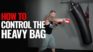 How to Hit the Heavy Bag Properly So It will not Swing [upl. by Ahsekin394]