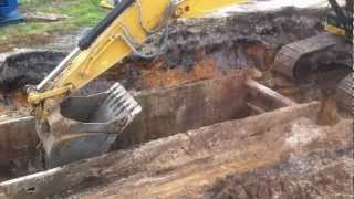 Caterpillar 336E excavator digging for storm pipe [upl. by Secilu]