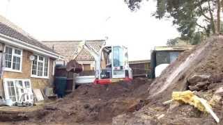 Takeuchi TB016 loading a truckTime Lapse [upl. by Abbi]