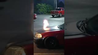 Car shoots flames out of hood [upl. by Iznek]