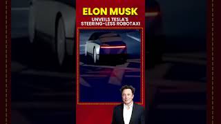 Elon Musk reveals Teslas latest twodoor robotaxi featuring no steering wheel or pedals [upl. by Caton451]