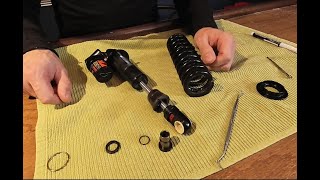 How to remove spring on Fox DHX2 Tech Tuesday [upl. by Etnoj]