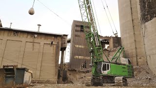 INSANE wrecking ball action with a Sennebogen 6130E demolition excavator [upl. by Ennayelsel]