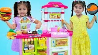 Suri and Annie Cooking Pretend Food with Toy Kitchen Play Set [upl. by Eerbua]