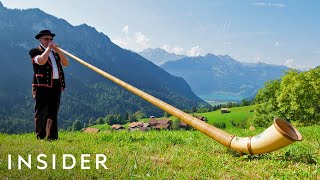 How To Play The Alphorn  Make Cowbells In Switzerland  Travel Dares S2 Ep 8 [upl. by Kissie]