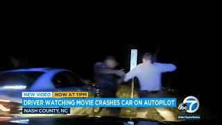 Video Tesla on autopilot crashes into state troopers cruiser due to driver watching a movie l ABC7 [upl. by Enyawed]