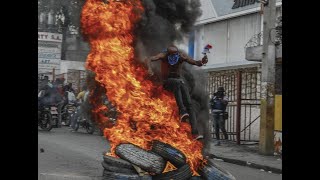 Demonstrators protest in Haiti calling for the resignation of the Prime Minister [upl. by Elizabet]