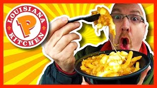 Popeyes Louisiana Kitchen Cajun Poutine Review [upl. by Eeralih]