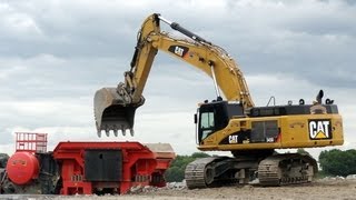 CAT 345D loading crusher [upl. by Julianne650]