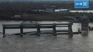 Crews work to remove barges stuck at McAlpine Lock and Dam [upl. by Gnuhn]