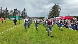 Drum Major leads Ballater Pipe Band playing Cabar Feidh on march during 2024 Dufftown Highland Games [upl. by Awe696]